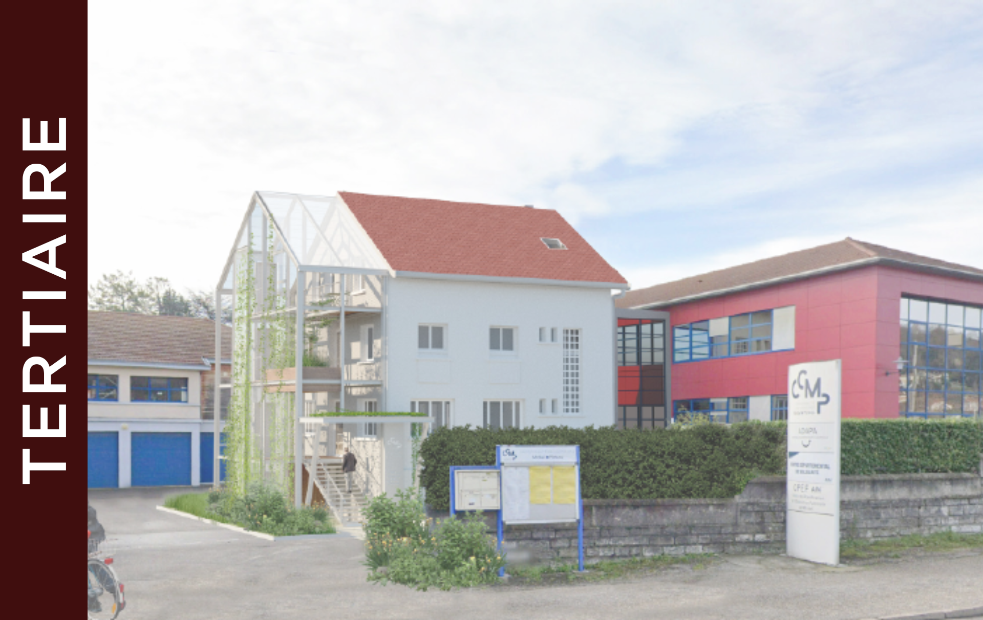 Un bâtiment moderne avec une extension en verre et un toit rouge est marqué "TERTIAIRE" sur le côté. A côté se trouve un bâtiment rouge et bleu, avec une enseigne devant. L'espace est pavé et bordé d'arbustes.